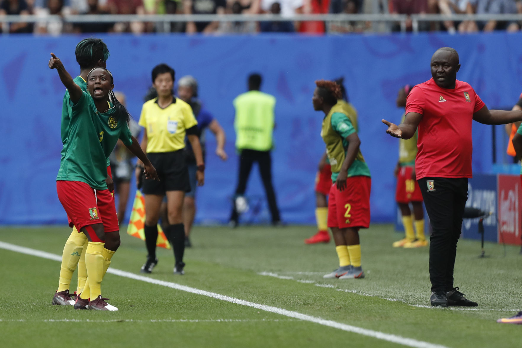 Cameroon's Ajara Nchout, left, and Cameroon head coach Alain Djeumfa react after a VAR decision that ruled out Cameroon's Ajara Nchout's goal for offside during the Women's World Cup round of 16 soccer match between England and Cameroon at the Stade du Hainaut stadium in Valenciennes, France on Sunday. — AP Photo/Michel Spingler